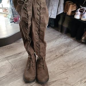 Thigh high lace up boots